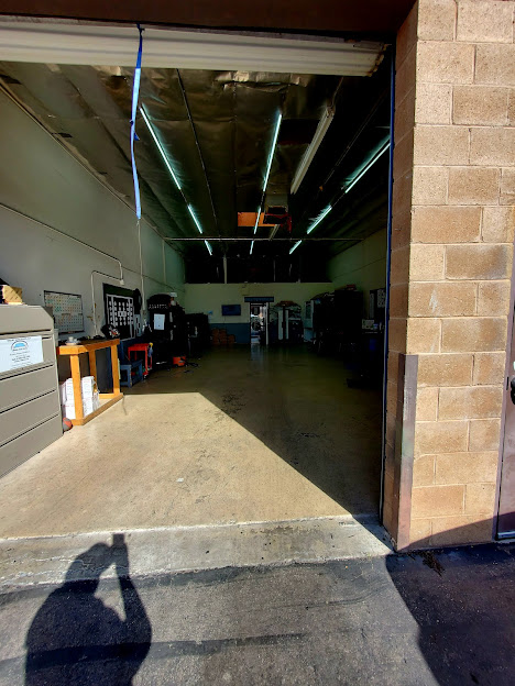 Open Shelby Auto Glass Tucson shop bay used for customer service and insurance support